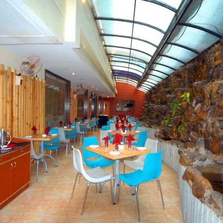 Aj International Hotel Bangalore Restaurante foto
