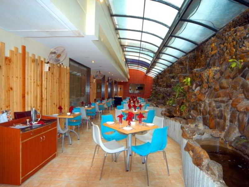 Aj International Hotel Bangalore Restaurante foto